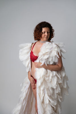 Artistic boudoir portrait celebrating individuality and self-confidence