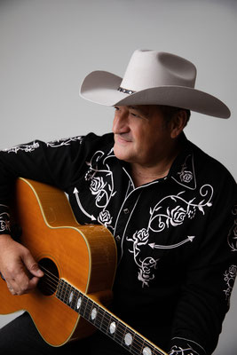 Expressive artist portrait for country singers and musicians.