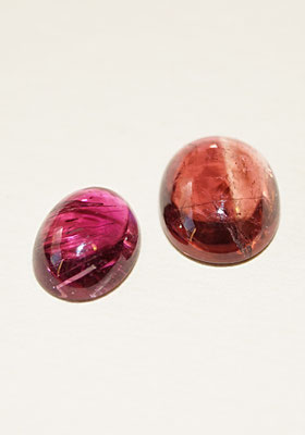 2 Tourmalines cabochon ovale, rose et orange.