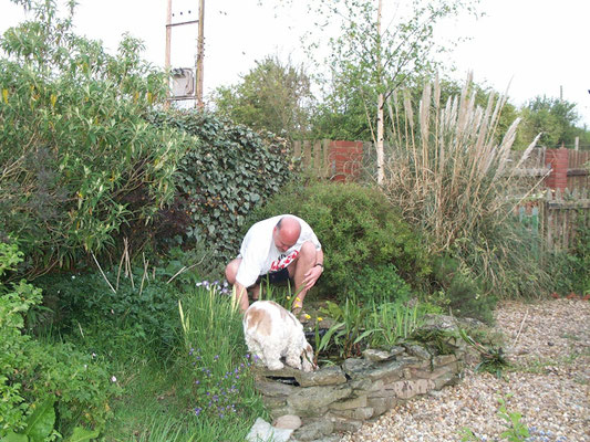 Sophie looking in the pond at Huxleys Barn