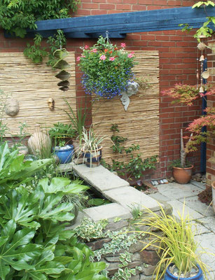Huxleys Barn: ornamental pond (at the back)