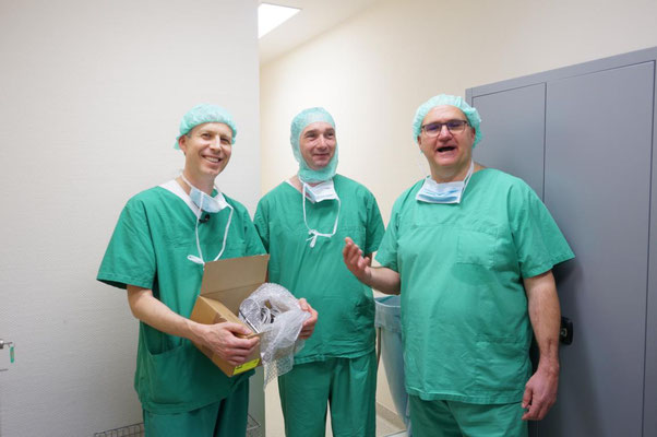 Werner with the newly donated surgical instruments next to Mr. Matuschek from the company Ruck and our liason doctor Schwarz.