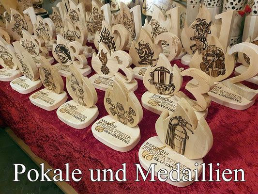 Pokale mit Platzierung, Trostpreise, Medaillen aus Zirbenholz in echter Handarbeit.