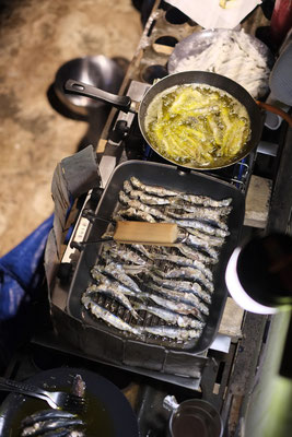 Fresh sardines directly from the fisher boat bought with the canoe.