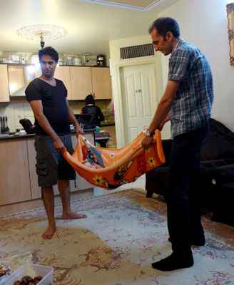 Men take care of their children after work.