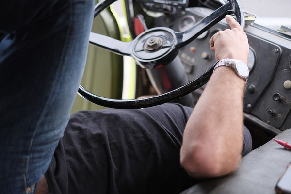 Working on the truck. Joerg is trying to fix himself and the truck.