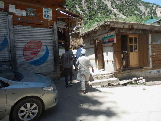 Pakistani tourists, mostly are male, are hanging around the village.