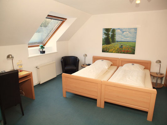 Dreibettzimmer