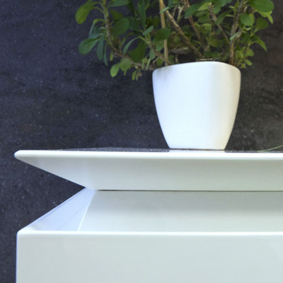 White table fabricated from Corian 