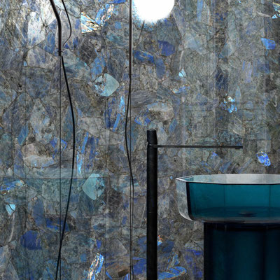 Luxurious shower wall fabricated from labradorite 