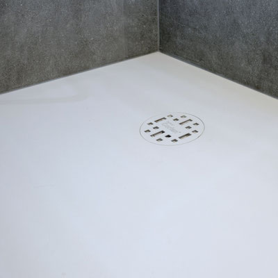 White shower pad from Corian solid surface