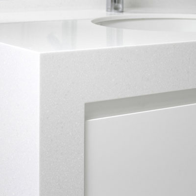 Bathroom vanity in Corian Antarctica solid surface with built-in ceramic washbasin / fabricator: Gforma