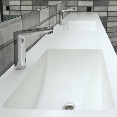 Acrylic solid surface vanity with integrated sinks at a business centre wc / fabricator: Gforma