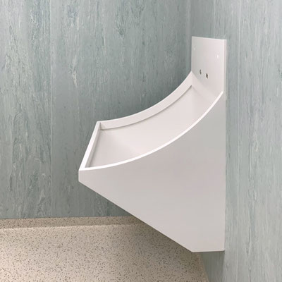 Medical sink at a hospital fabricated from hygienic solid surface 