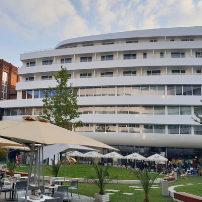 The facade of Hilton Hotel in Wroclaw is made of acrylic stone