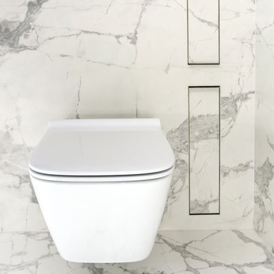 White and grey porcelain walls in the bathroom 