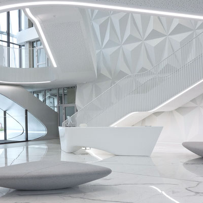 Business centre reception desk of artistic shapes made from white solid surface / fabricator - Gforma