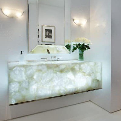 Hanging bedroom console from translucent white agate with installed LED lights