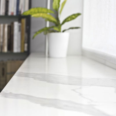 Broad windowsill in Laminam Calacatta