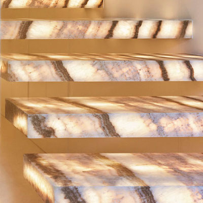 White onyx stairs with brown veins look magic when backlit