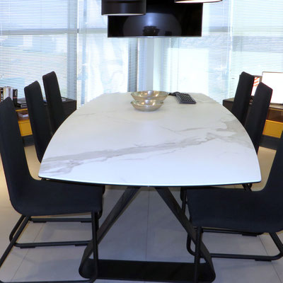 Conference table topped with thin Neolith sintered stone slab 