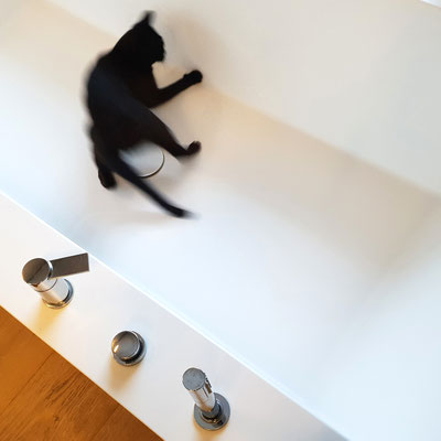 Bathtub fabricated from white acrylic solid surface 