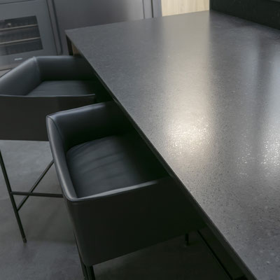 Black sintered stone table in the kitchen