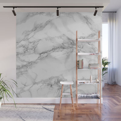 Hanging partition wall from light marble with grey veins