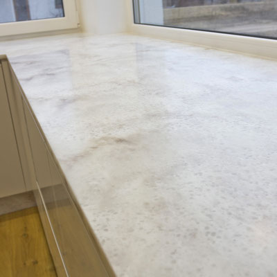 Kitchen worktop merging with windowsill from Corian solid surface