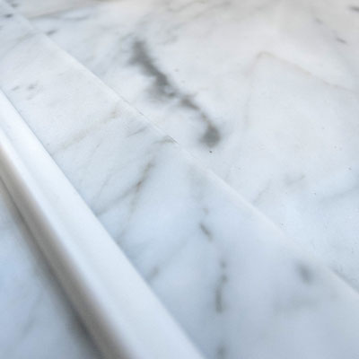 Shower pad from natural white and grey marble 