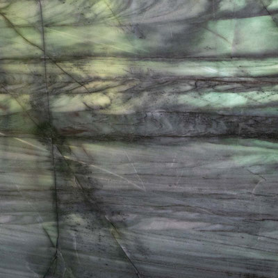 Translucent green quartzite wall backlit by natural light 