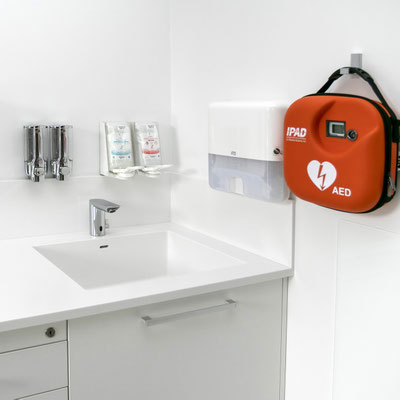 Laboratory worktop with integrated sink at a medical centre fabricated from white solid surface