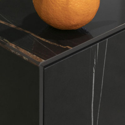 Black restaurant counter made from thin ceramic slab Ariostea Sahara Noir