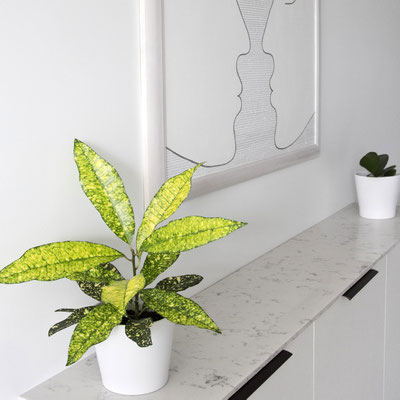 Console top from white engineered quartz with grey pattern