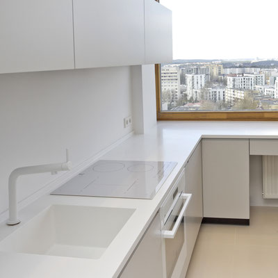 Acrylic solid surface worktop continuing into windowsill