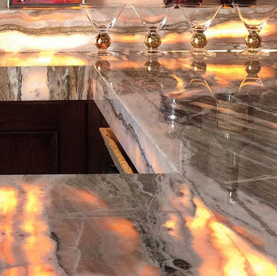Translucent onyx countertop in a luxurious bar