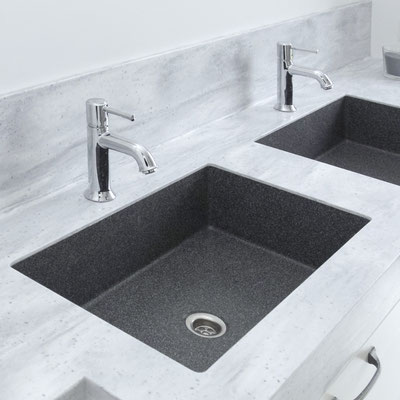 Double solid surface vanity with integrated sinks fin two shades of grey / fabricator: Gforma