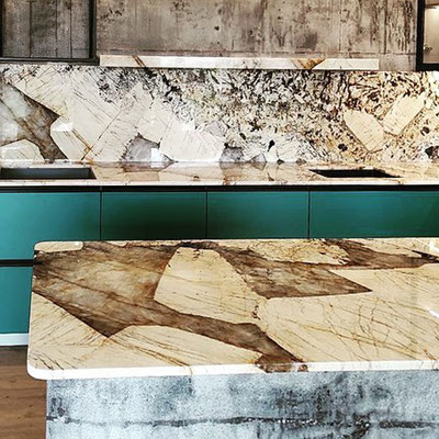 Kitchen island topped with Patagonia granite slab 