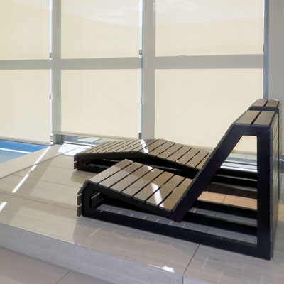 Swimming pool loungers fabricated from Neolith sintered stone 