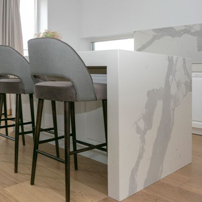 Kitchen table combined with kitchen island fabricated from Laminam by Akmens Šalis