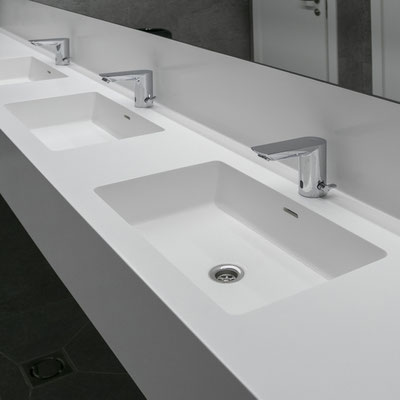 Twin washbasin with high curb in acrylic stone for business centre wc 
