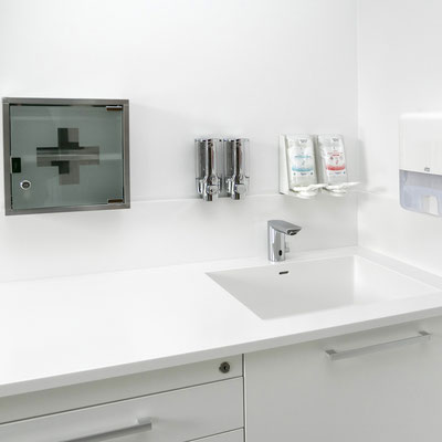 Medical worktop with integrated sink and splashback fabricated from acrylic solid surface