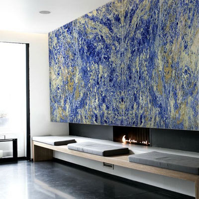 Blue marble wall as a fireplace decoration