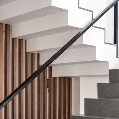 Stairs clad with grey Silestone engineered quartz