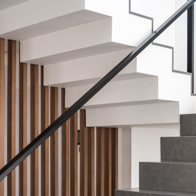 Stairs clad with grey Silestone engineered quartz