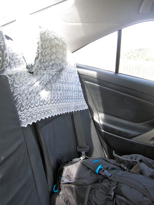 How is one supposed to fasten the seat belt? (Answer: one isn't)