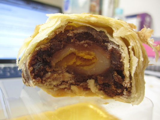 Red bean paste, mochi and an egg york inside the moon cake