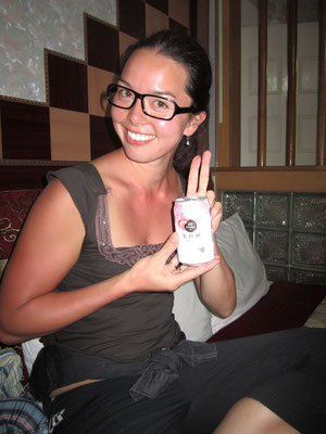 Enjoying a sunburn and a litchi beer