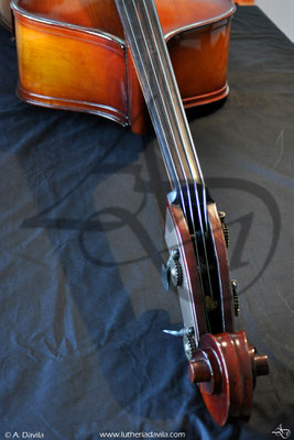 Repair broken neck and new headstock on double bass.