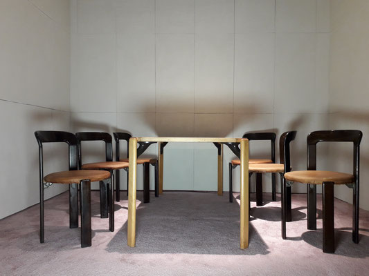 Dining Set with six leather upholtered ebonized model "Rey 3300" chairs ,designed by Bruno Rey, manufactured by "Dietiker Stein am Rhein", Switzerland, 1971.